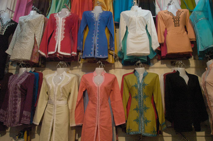 Photo clothes Marrakesh shop medina souk with traditional Moroccan clothes