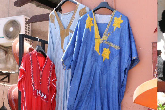 Photo clothes Marrakesh shop medina souk with traditional Moroccan clothes