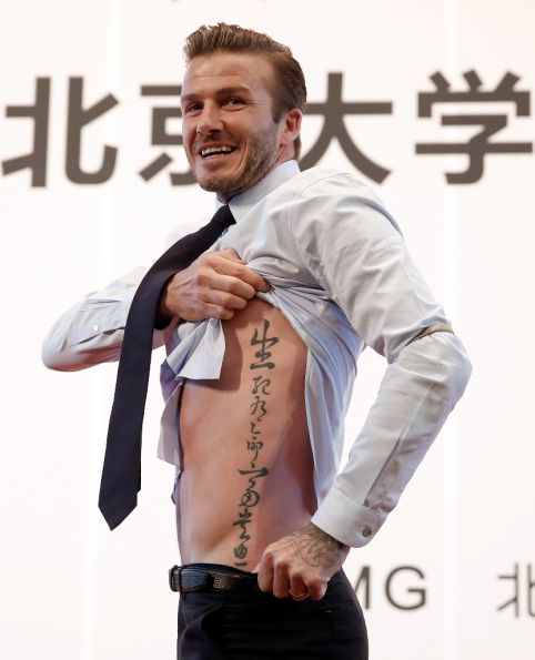 Ribs Tattoo for Men – Script Tattoo Design Ideas, David Beckham’s 