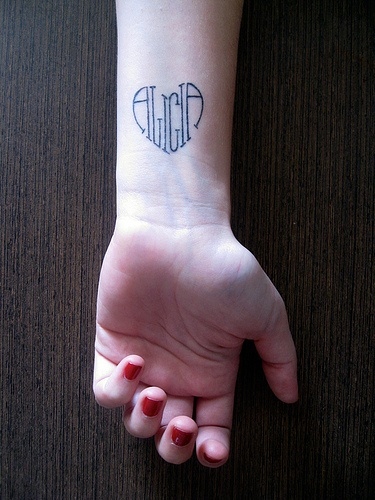 Heart shape tattoo design with name Alicia
