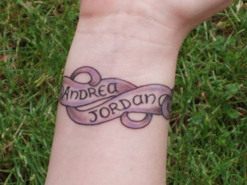 Ornamental bracelet tattoo design with names