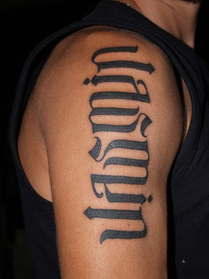 Vertical Name Tattoo Design over Shoulder and Bicep