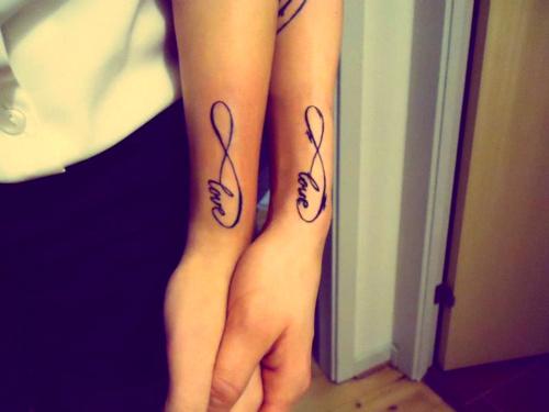 Infinity with word love tattoo design – tattoo ideas for couples