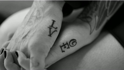 Couples tattoo idea - word Love tattoo design