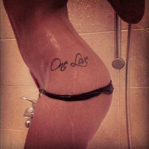 Love word tattoo idea on the hip for female