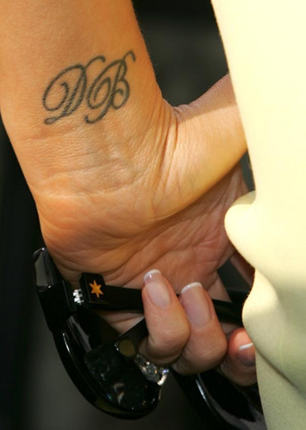Victoria Beckham tattoo design on wrist