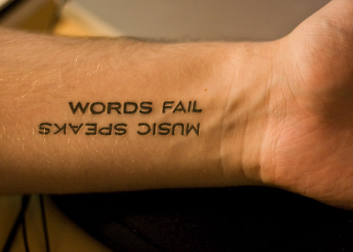 Funny Script Tattoo Idea for Inner Arm