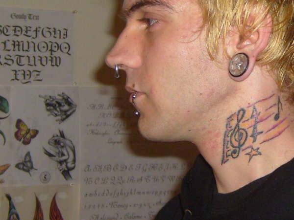 Music note neck tattoo ideas for men