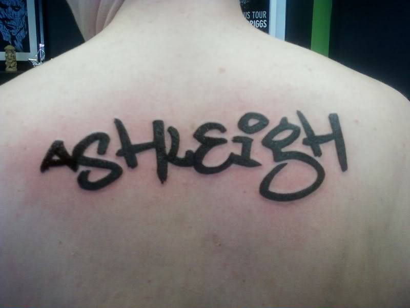 Ashleigh name tattoo design across the back