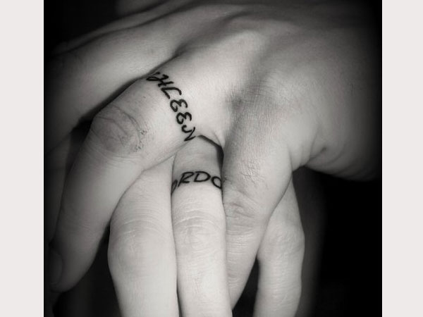 Wedding band tattoo with names design