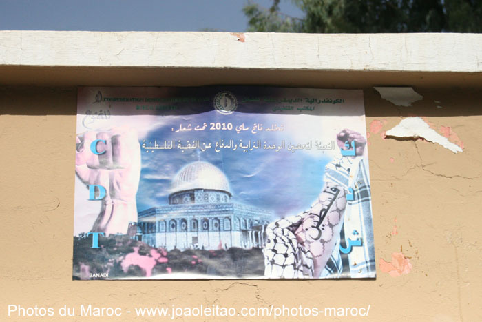 Poster avec des sujets de Palestine dans un mur à la ville de Taroudant