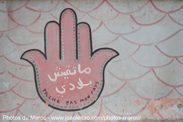 Peinture murale avec Touche pas mon Pays Maroc