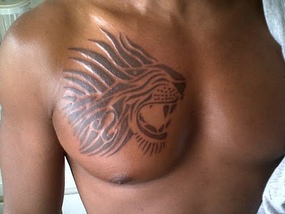 Chest Tattoo for Men - Lion Tattoo Design Ideas, tribal style lion design tattoo on the side of the chest