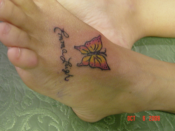 Butterfly and name tattoo design on foot for women