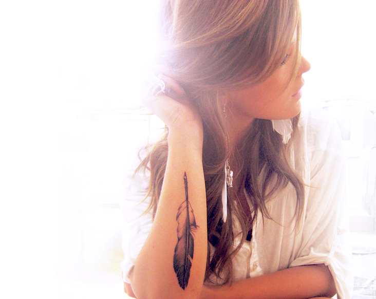 feather tattoo designs on arm for women
