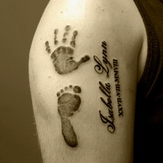 kids hand print tattoo design on bicep