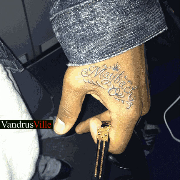 Maybach name tattoo design on right top of the hand
