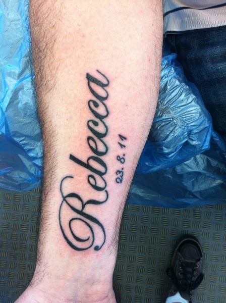 Rebecca Name Tattoo Design on Arm