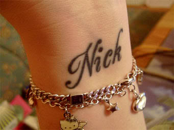 wrist name tattoo idea for female