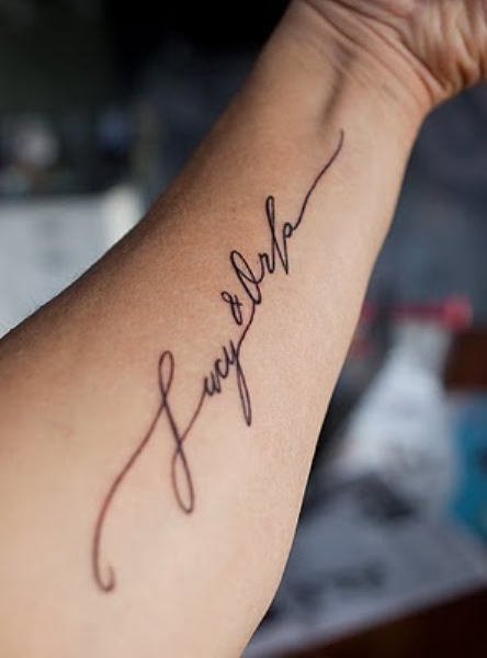 Lettering arm tattoo design for female