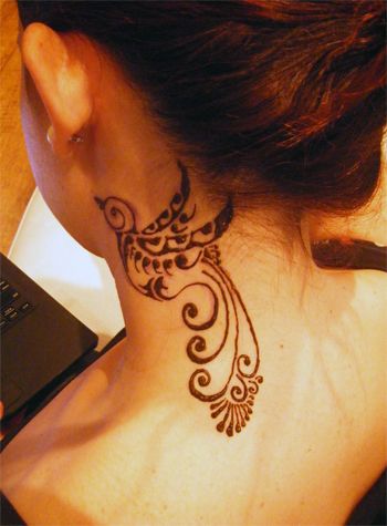 Ornamental bird tattoo designs on neck