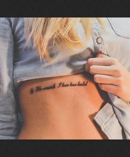 Inspirational Quote Tattoos on the Ribcage