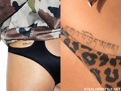 Rihanna Hebrew script tattoo on the lower back