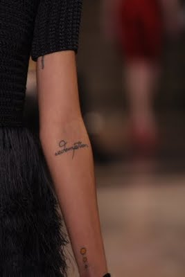 Small script tattoo designs on forearm