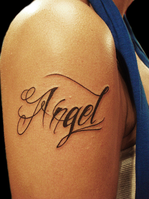 Angel Name design tattoo on shoulder for female