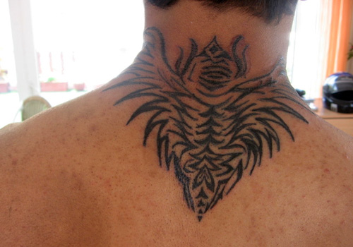 Tribal wings neck tattoo designs for men