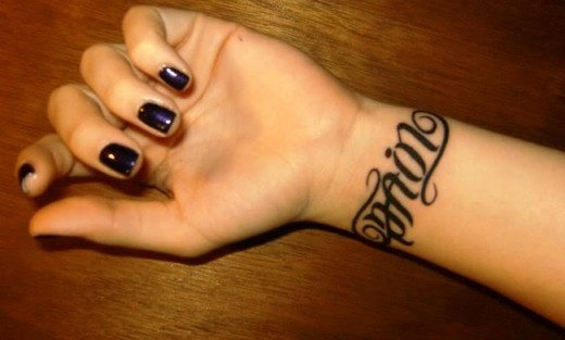 Wrist bracelet name tattoo idea for women