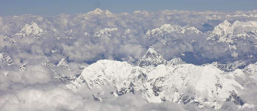8 Days Tibet Tour - Kathmandu to Lhasa Overland Mount Everest seen from the airplane from Lhasa to Kathmandu