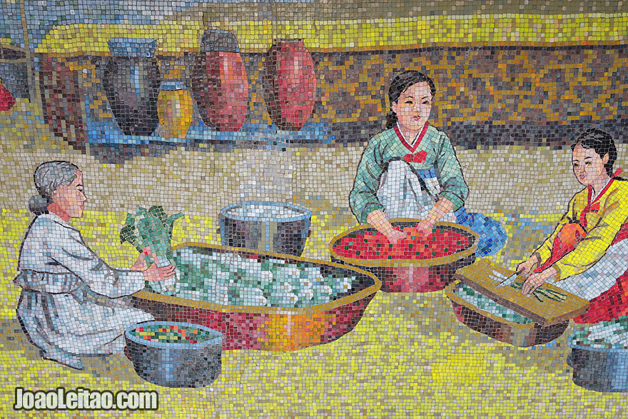 Mosaics depicting Korean traditional life, with women cooking vegetables. This set of mosaics can be found at the Sariwon City Fold Museum.