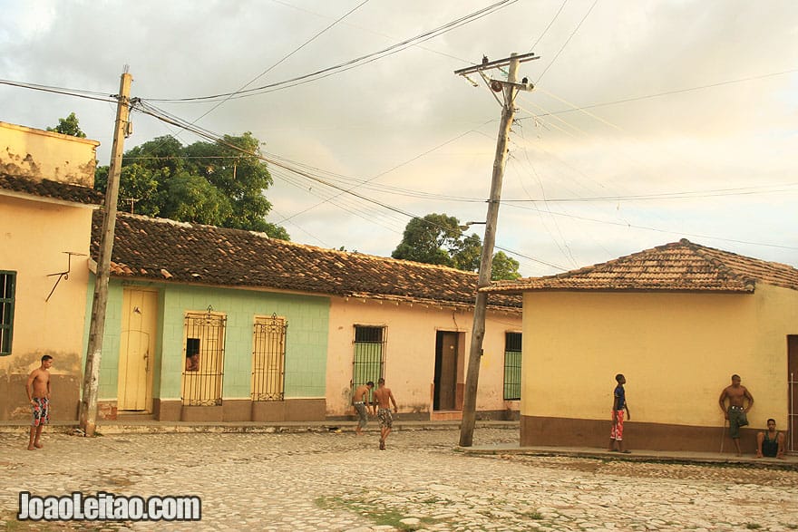 Boys playing soccer on the streets of Trinidad