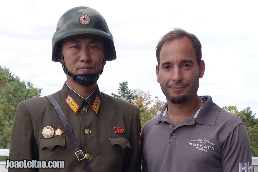 Taking photos with DPRK officials.