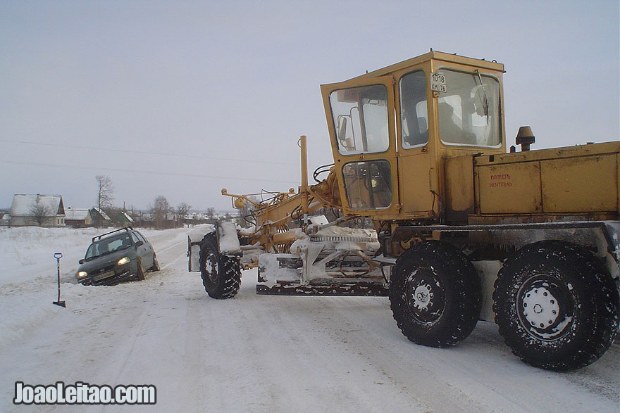 Driving in Russia • 1-Month Winter Road Trip » 5000 Km My car being towed by a road graver