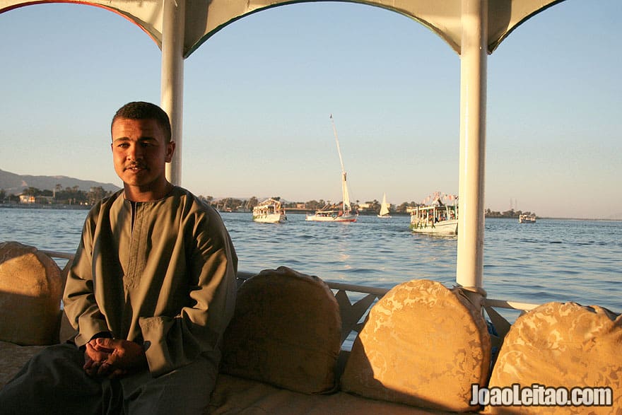 Egyptian Man crossing the Nile river from the East Bank to the West Bank