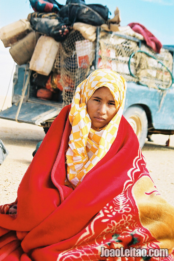 Photo of Girl in Sahara Desert tracks of Sebkhet Oum way to Bir Moghrein,  Mauritania
