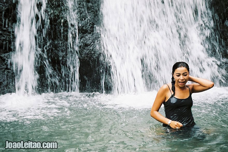 Photo of Moroccan girl refreshing herself in the waterfalls of Ourika Valley, Morocco