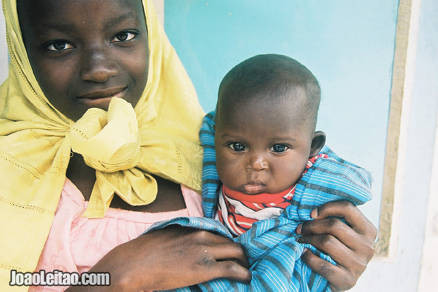 Girl and baby in Serekunda, The Gambia West Africa