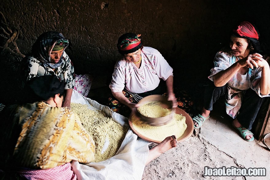 Photo of Berber women preparing couscous, Morocco