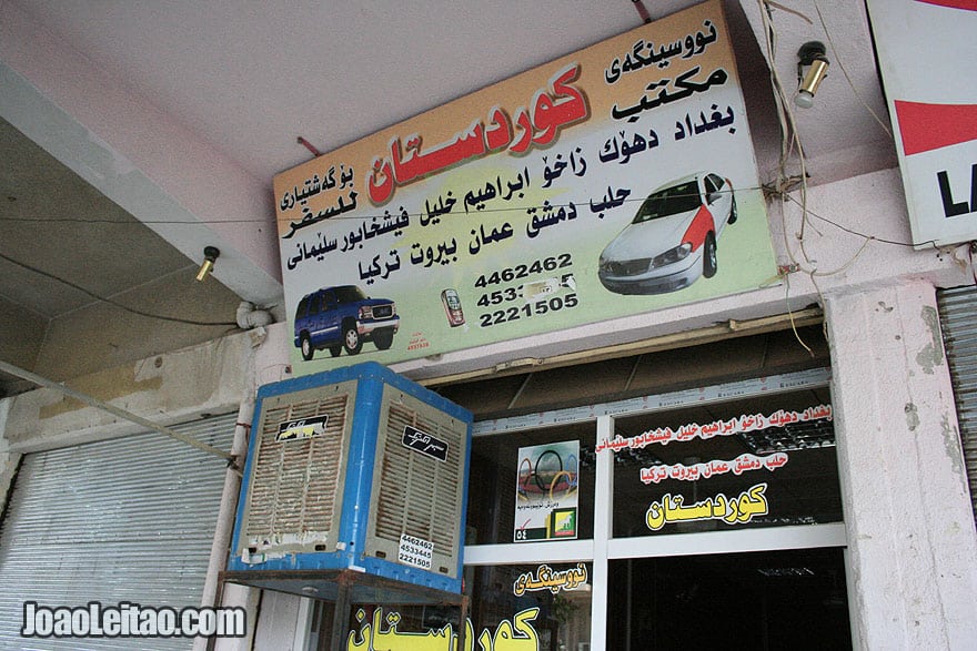 Northern Iraq Travel Guide: 2-week itinerary & best destinations Sign with phone and Company name