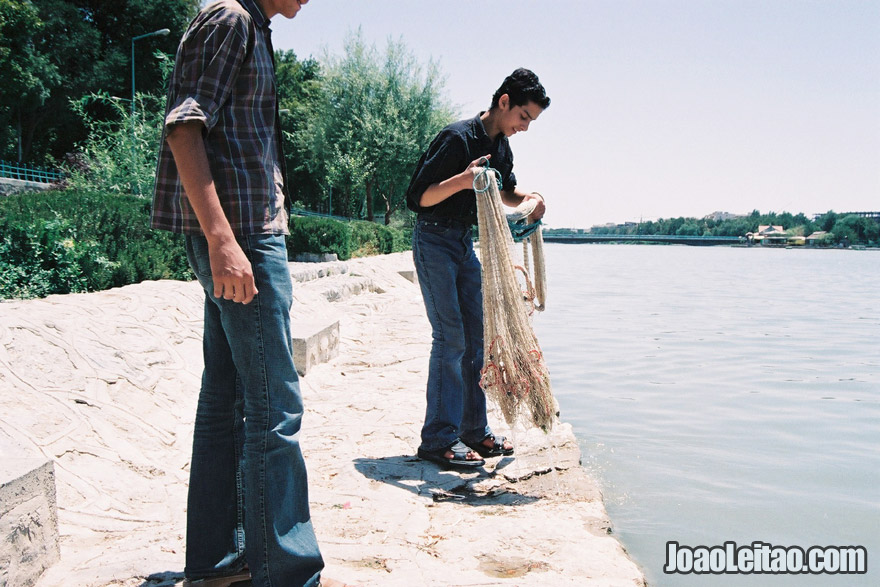 Boys fishing in River Zayandeh in Isfahan