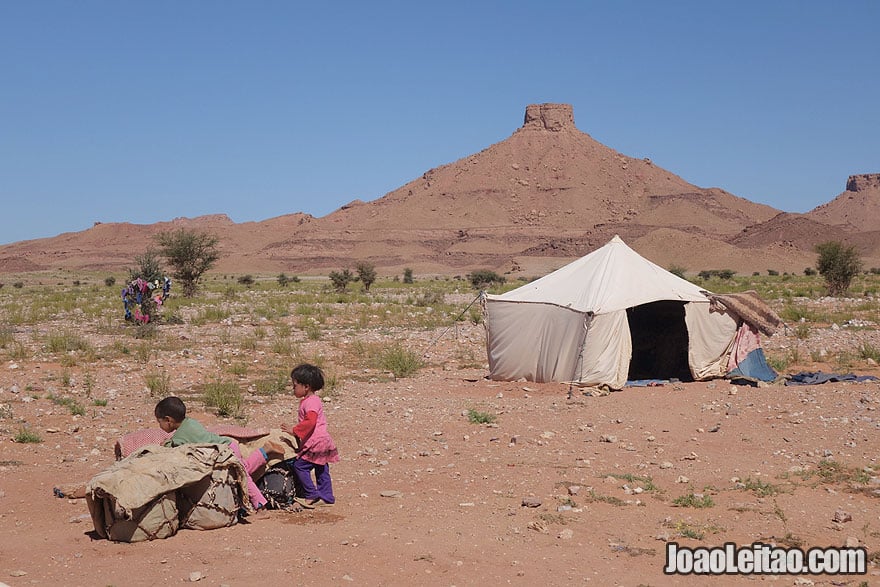 Nomad children playing near tent