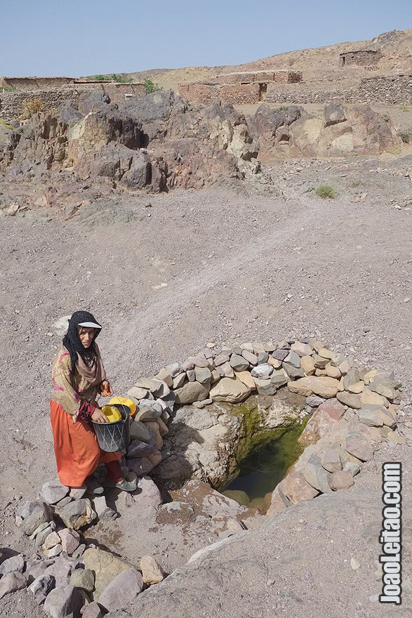 Woman getting water from well in Azib N Oudad