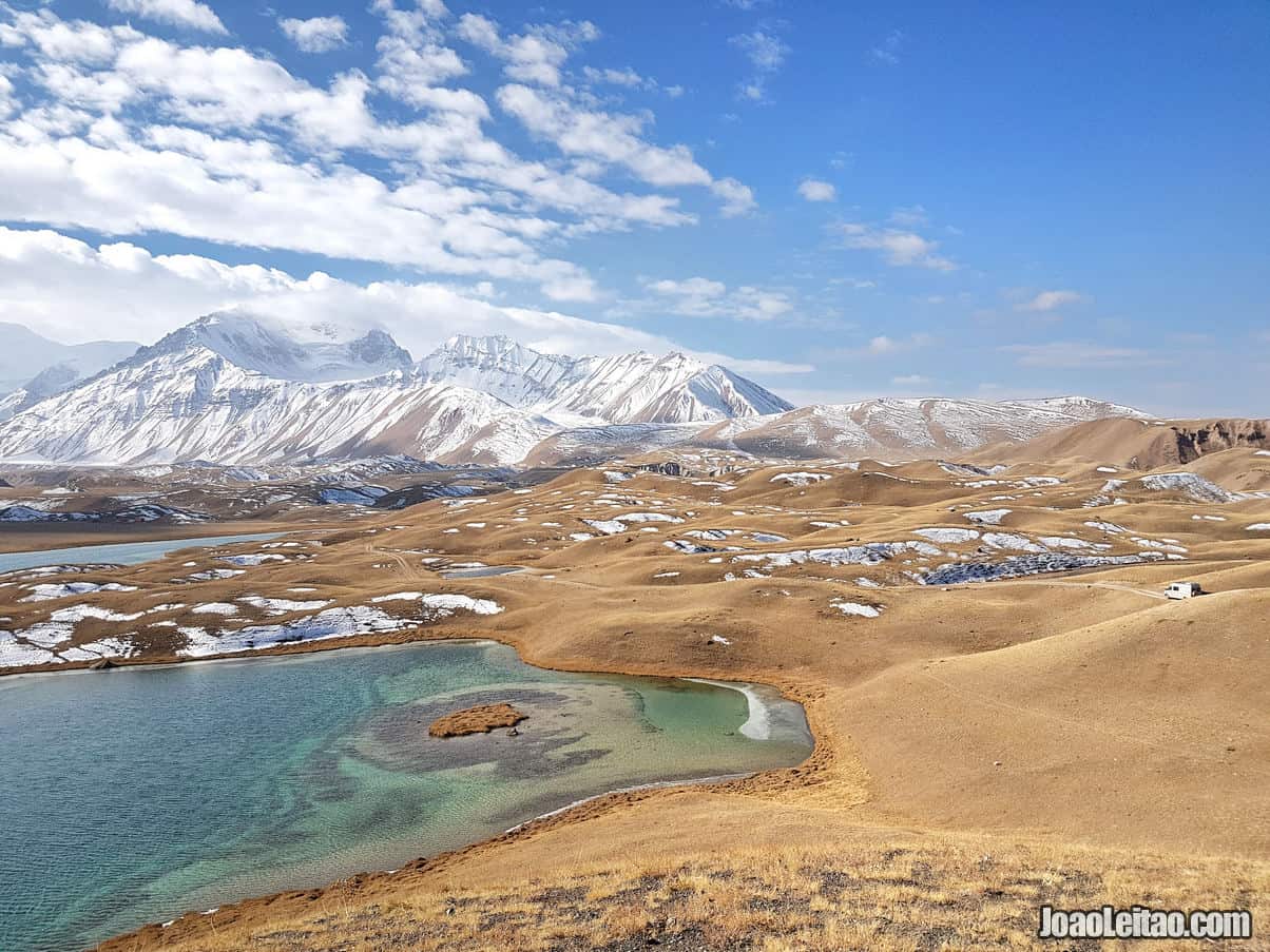 Stunning view near Tulpar-Kol Lakes and Mercedes-Benz Sprinter on the right side of the photo